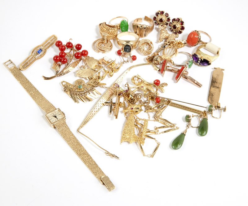 A collection of gold jewelry items