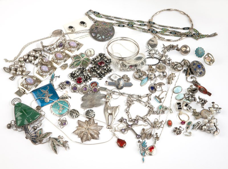 A collection of sterling and costume jewelry