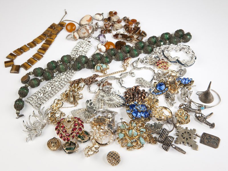 A collection of costume jewelry, sterling & gold