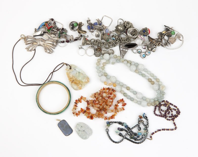 A collection of sterling and costume jewelry: Including Scandinavian and Mexican sterling, enamel, a charm bracelet, hardstone bead necklaces, pendants, bracelets, brooches, earrings, and rings; approximately 45 pcs, est: $200/400