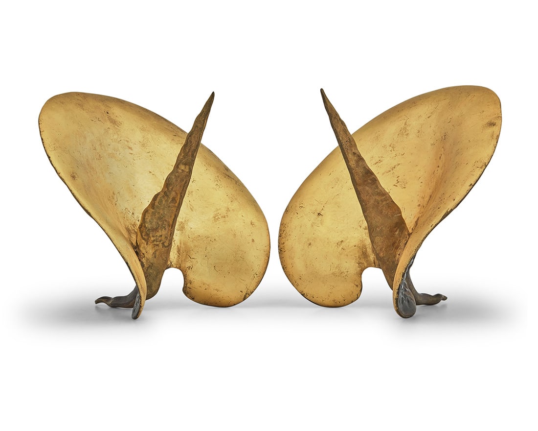 A pair of Marc Bankowsky parcel gilt bronze 'Feuille de Chou' candlesticks: A pair of Marc Bankowsky parcel gilt bronze 'Feuille de Chou' candlesticks 2009 Each incised: M Bankowsky / 09 Each in the form of a cabbage leaf, with 24k gilding to one side 2 pieces Each: 7.75" H