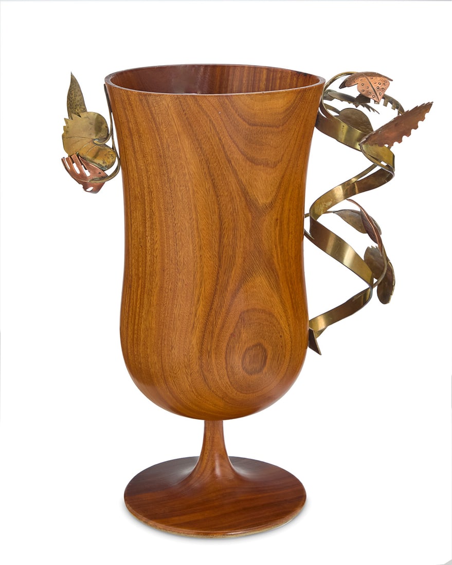 Karl Hagenauer (1898-1956), A turned wood and mixed metal cup, mid-20th century: Karl Hagenauer (1898-1956)A turned wood and mixed metal cup, mid-20th centuryImpressed in the brass ribbon: [artist's cipher] / Made in AustriaWith applied hand-wrought brass and copper foliate elemen