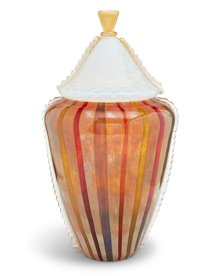 A large Cenedese Murano art glass lidded vase: A large Cenedese Murano art glass lidded vaseMid/late 20th centuryEtched to underside: CenedeseWith vertical stripes, the lid with gilt-embedded accentsOverall: 24.5" H x 13.375" W x 12.75" D Provenan