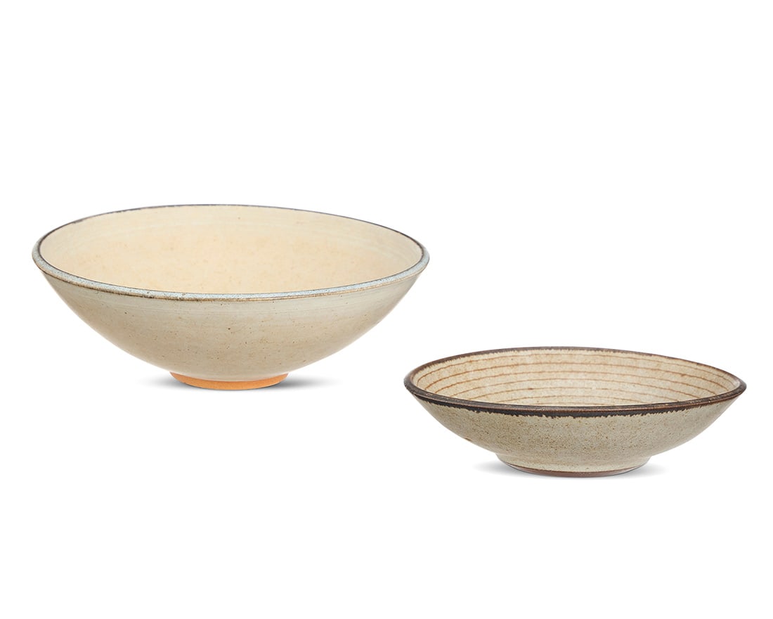 Harrison McIntosh (1914-2016), Two glazed stoneware low bowls, mid-20th century: Harrison McIntosh (1914-2016) Two glazed stoneware low bowls, mid-20th century Smaller impressed with potter's chop mark: HM; applied paper label to the underside: Handthrown Stoneware / Harrison