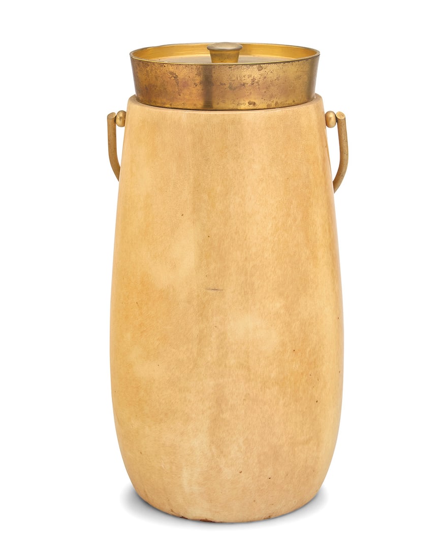 Aldo Tura (1909-1963), A tall champagne ice bucket, circa 1960s: Aldo Tura (1909-1963) A tall champagne ice bucket, circa 1960s With applied label to underside: TU milano italia With lacquered goatskin-clad wood body and brass liner, lid, and handle 15.875" H x