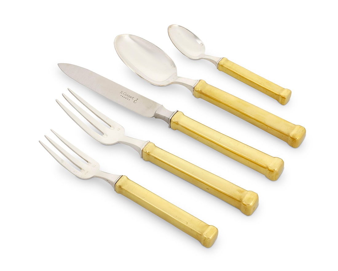 A JL Coquet silver plated partial flatware service: A JL Coquet silver plated partial flatware service Late 20th/early 21st century Each impressed with maker's marks Each with gilt-metal handle Comprising: 11 dinner forks (8") 11 salad forks (6.875")