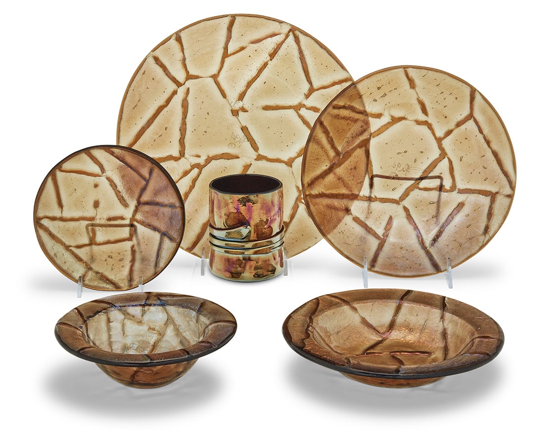 A Paul Hathcoat iridescent glass partial dining service: A Paul Hathcoat iridescent glass partial dining service Late 20th century Plates and bowls with etched initials and date to underside: PH 94; cups with etched signature and date: Esteban Prieto /