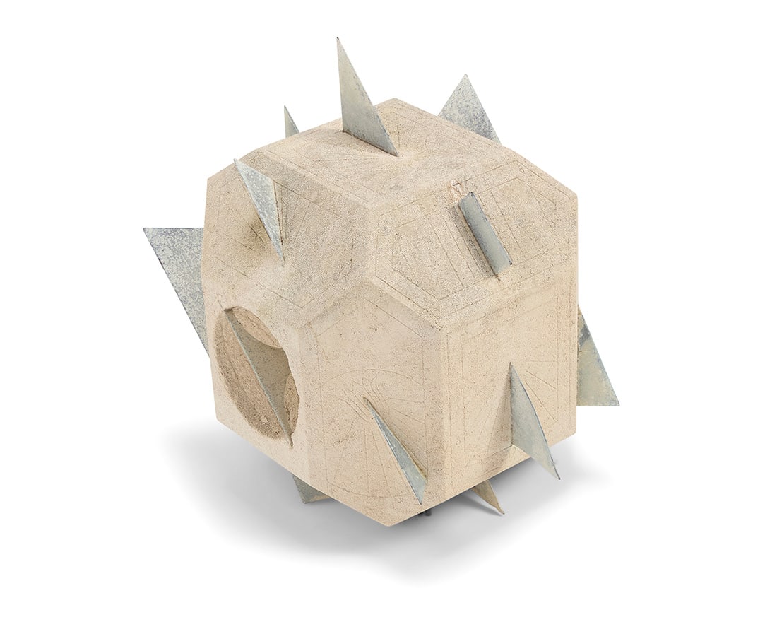 A Modern polygonal cast stone and metal sundial: A Modern polygonal cast stone and metal sundial Mid/late 20th century Unmarked With incised trimming 16.5" H x 16.75" W x 11.75" D Provenance: The Estate of Elaine Wynn