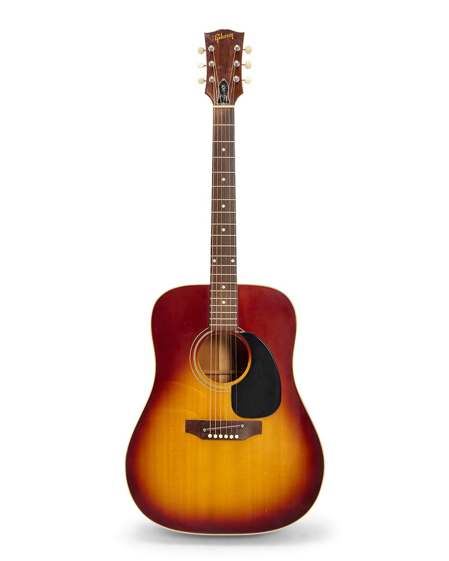 A Gibson J-45 Deluxe acoustic guitar (1 of 9)