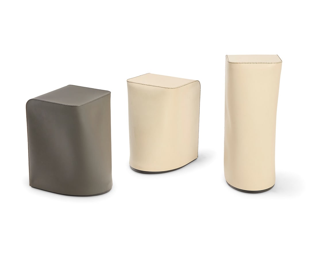 Three Skram Furniture Co. leather stools: Three Skram Furniture Co. leather stoolsEarly 21st centuryEach impressed to underside: skram / furniture companyLeather clad wood3 piecesTallest: 25.5" H x 10.5" W x 12" D; Each shorter: 18.5" H x 12.