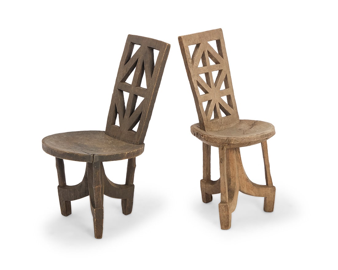 Two African carved wood chairs (1 of 8)
