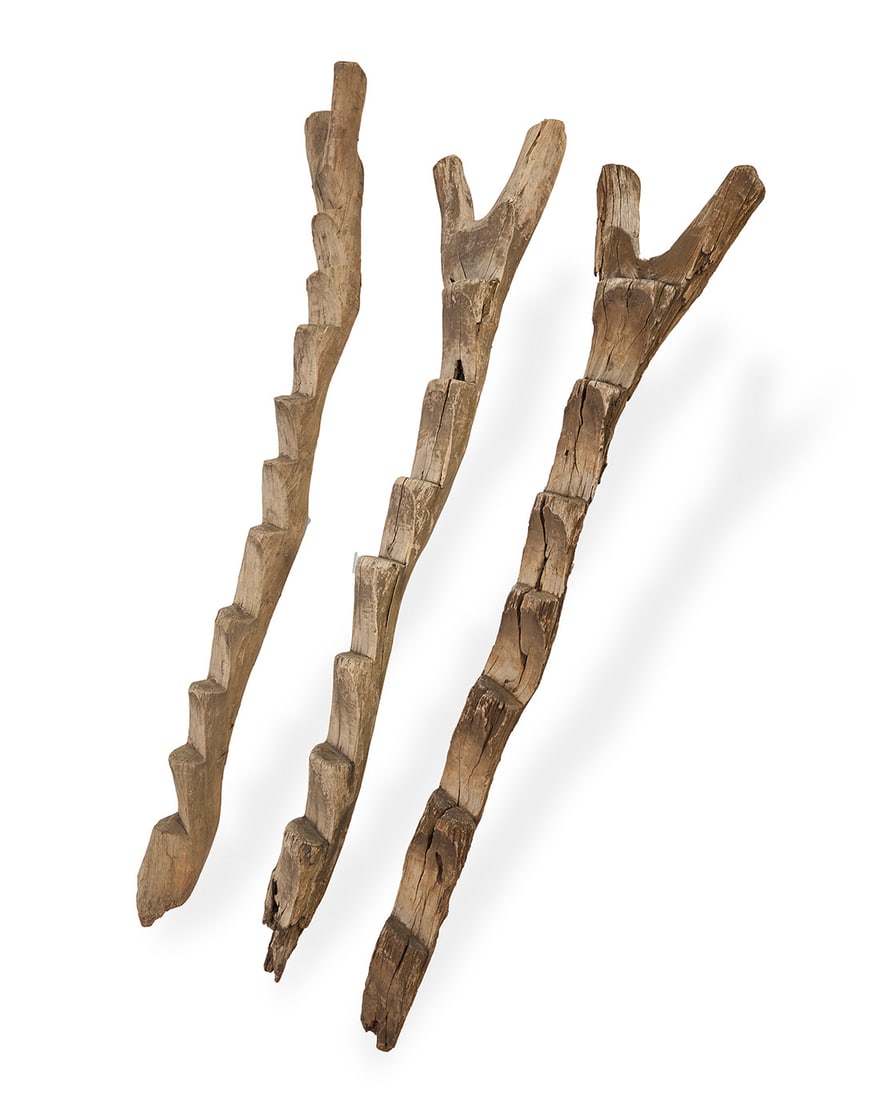 Three Dogon wood granary ladders: Three Dogon wood granary ladders20th centuryEach with notched steps3 pieces80" H and 77" H and 72" H Provenance:Collection of Stefan Lawrence, founder of Twentieth Gallery, Los Angeles, CAO