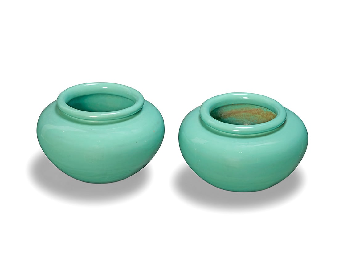 A pair of Pacific turquoise glazed pottery planters: A pair of Pacific turquoise glazed pottery plantersSecond quarter 20th centuryEach marked in the molding: PACIFIC / MADE IN USA2 piecesEach: 10.625" H x 17" Dia.