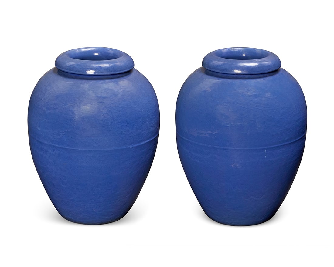 A pair of Bauer blue glazed pottery oil jars: A pair of Bauer blue glazed pottery oil jars Circa 1930s Each unmarked 2 pieces Each: 21.25" H x 17" Dia.