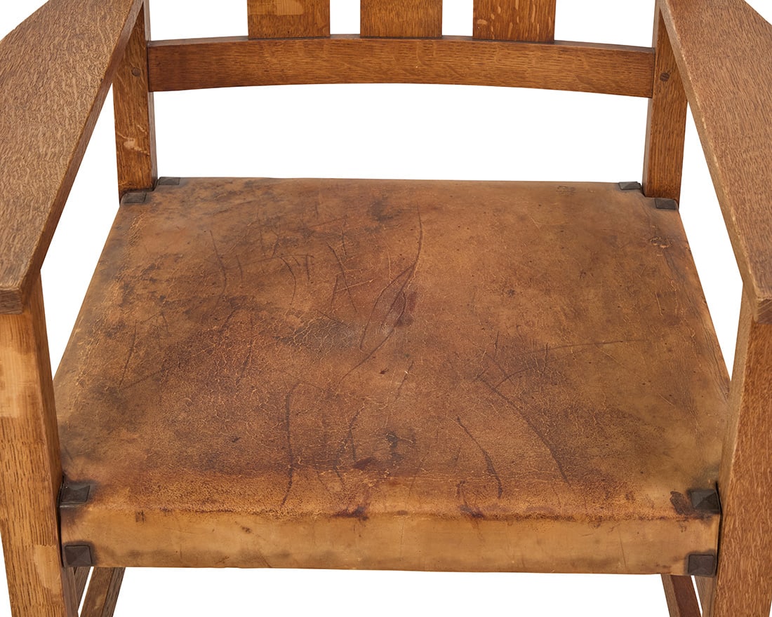 A set of ten Gustav Stickley oak dining chairs, nos. 350 & 366 - 7