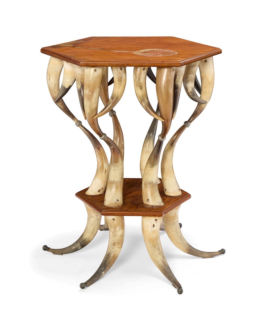 A Contemporary horn and wood side table: A Contemporary horn and wood side table Mid/late 20th century Constructed from stacked bovine horns, with a hexagonal wood top and undertier 30.375" H x 28" Dia.