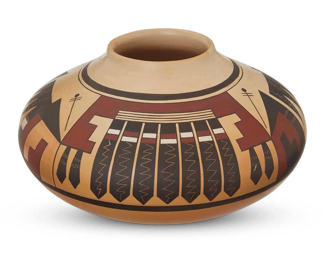 Madeline Sahneyah (b. 1954, Hopi-Tewa), A polychrome yellowware pottery jar, late 20th century: Madeline Sahneyah (b. 1954, Hopi-Tewa) A polychrome yellowware pottery jar, late 20th century Signed to underside: M [indistinct] / Sahneyah The four-color jar with white, red, and black feather and