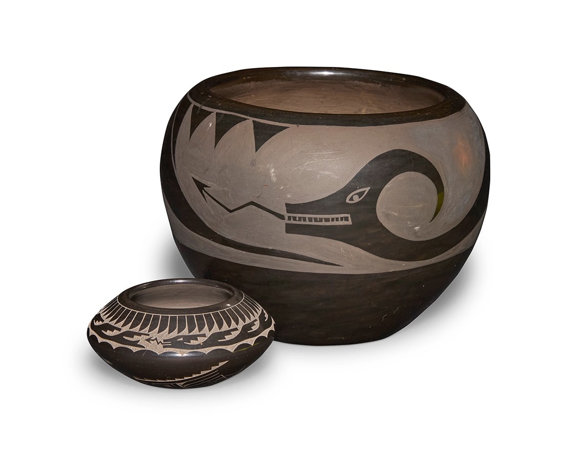 Two Santa Clara Pueblo blackware pottery vessels: Two Santa Clara Pueblo blackware pottery vessels Two works: Nicolasa Naranjo (1907-2002, Santa Clara Pueblo) A blackware pottery jar, mid/late 20th century Incised to underside: Nicolasa / Santa