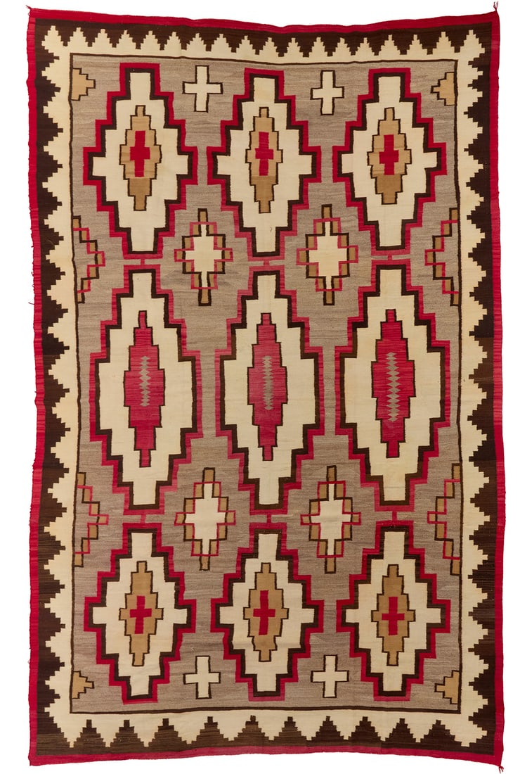 A large room sized Navajo regional rug: A large room sized Navajo regional rug Early/mid-20th century, Dine Woven in red, cream, natural grey, dark brown, and tan, with stacked and floating stepped diamonds 14' 10" H x 8' 10" W