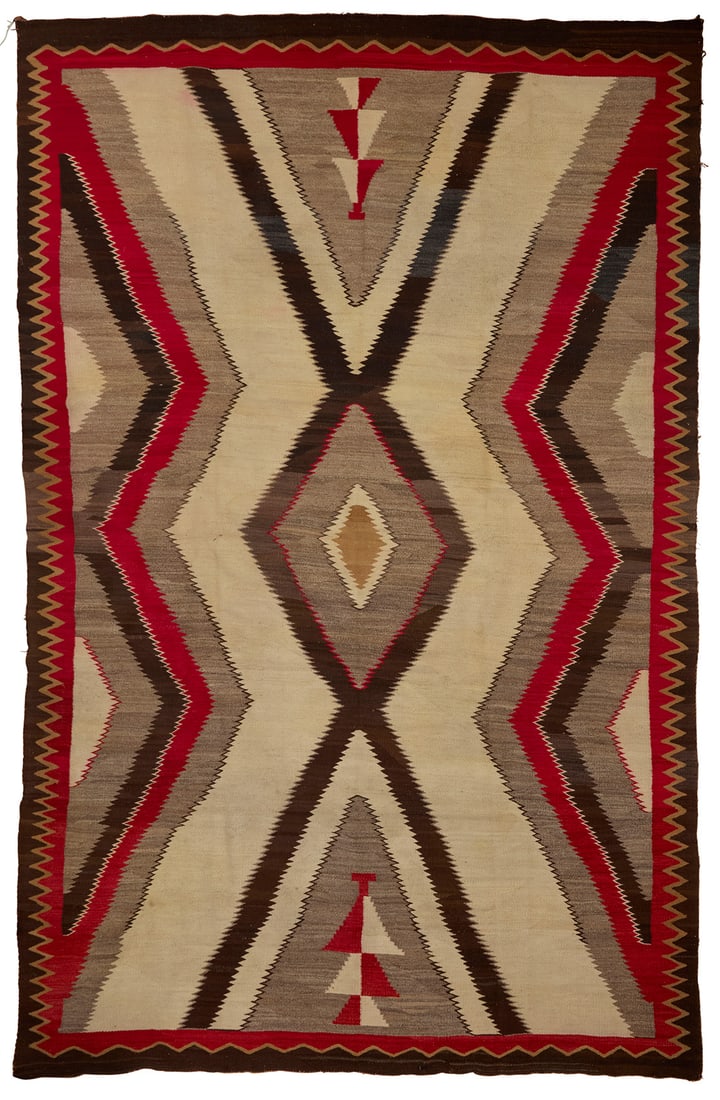 A large room sized Navajo regional rug (1 of 3)