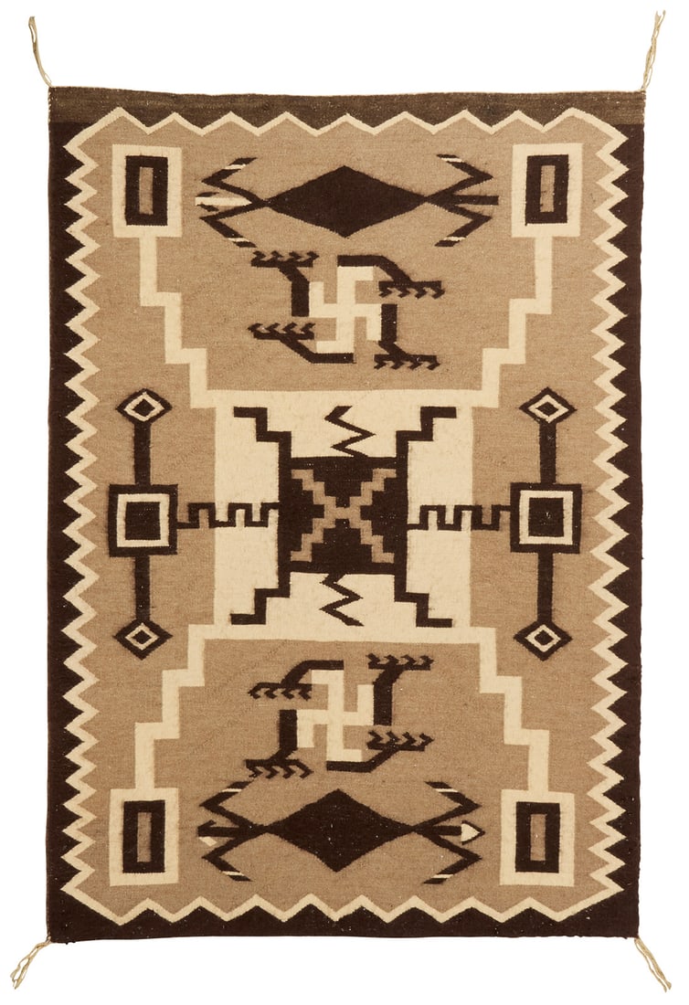 A JB Moore style Storm Pattern textile: A JB Moore style Storm Pattern textile Mid-20th century, Dine Woven in dark brown, tan, and cream wool, with waterbugs and whirling log motifs, plate XXVIII variation 58.25" H x 41.5" W Literature: