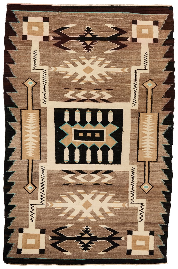 A Navajo storm pattern rug: A Navajo storm pattern rug Early/mid-20th century, Dine Woven in natural grey, natural dark brown, cream, ochre, and turquoise wool, with feather motifs at center, two waterbugs, and serrated long