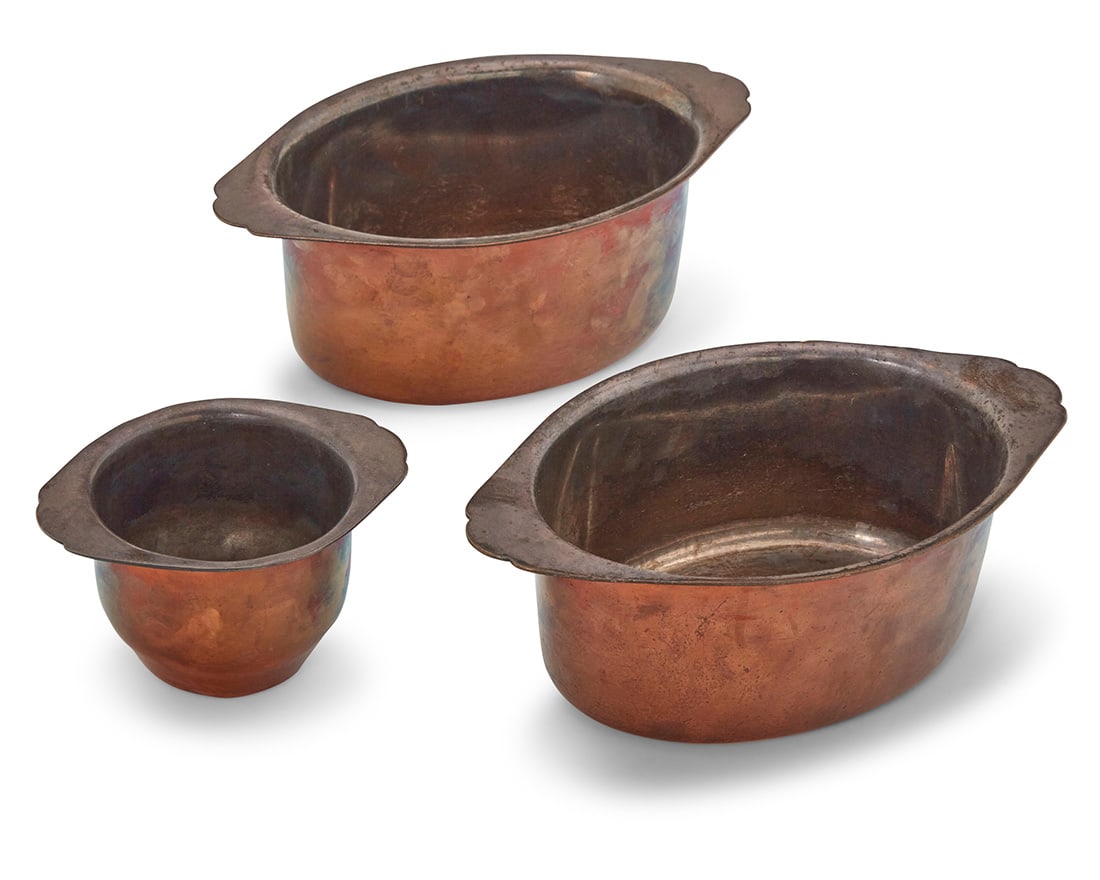 Joseph Heinrichs (1866-n.d.), A set of three sterling silver lined copper casseroles/gratins, early: Joseph Heinrichs (1866-n.d.) A set of three sterling silver lined copper casseroles/gratins, early 20th century Each impressed: JOS. HEINRICHS / NEW YORK / PURE COPPER / STERLING SILVER; smallest