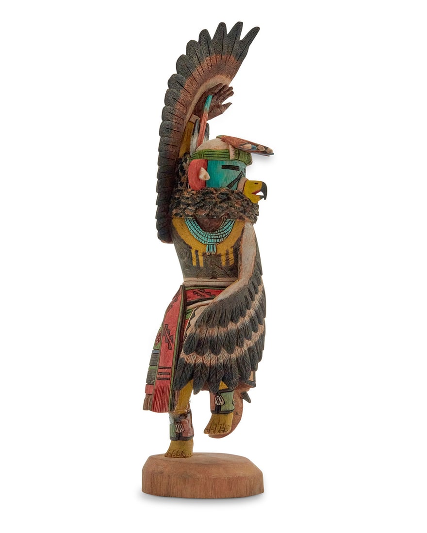 Brendan Kayquoptewa (b. 1970, Hopi-Tewa), A painted carved cottonwood Eagle Dancer katsina, early: Brendan Kayquoptewa (b. 1970, Hopi-Tewa) A painted carved cottonwood Eagle Dancer katsina, early 21st century Incised to base: [deer tracks] / B KAYQUOPTEWA Housed in a plastic display case with