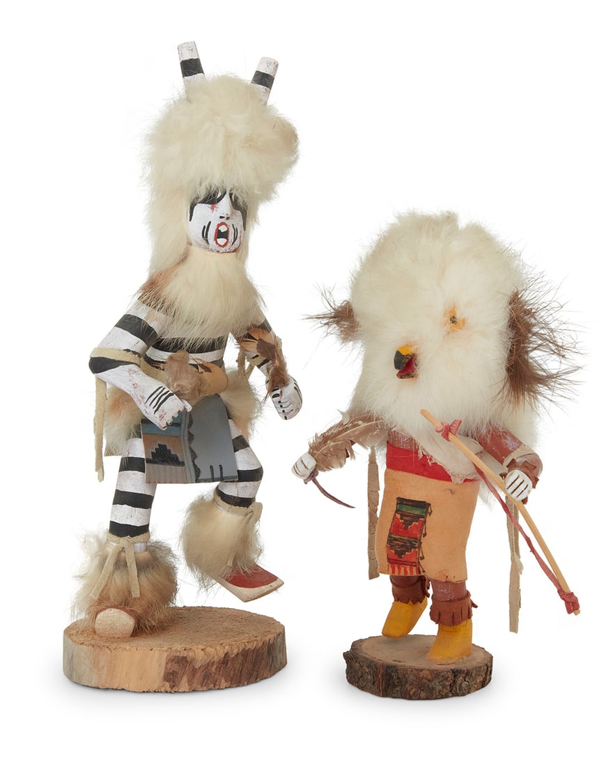 Two Hopi painted carved cottonwood katsinas: Two Hopi painted carved cottonwood katsinasTwo works:Virgil Long (b. 20th century, Hopi-Tewa)A Koshare 'Clown' katsina, early 21st centuryTitled and signed to underside: by: LongMounted with fur, hide