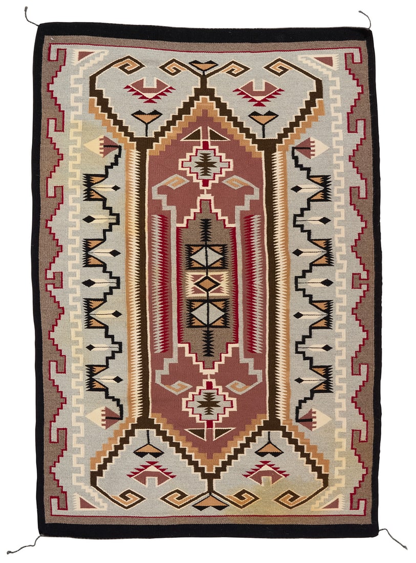 A Navajo Teec Nos Pos pictorial textile: A Navajo Teec Nos Pos pictorial textile Late 20th century, Dine Woven in grey, black, brown, red, and cream wool with central stylized stepped waterbug style hooked diamond and other geometric