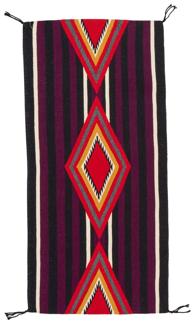 A Charlene Laughing Navajo Moki wearing Blanket Revival textile: A Charlene Laughing Navajo Moki wearing Blanket Revival textileLate 20th/21st century, DineWoven in red, orange, grey, purple, black, and cream wool featuring a band of concentric diamonds with serrat