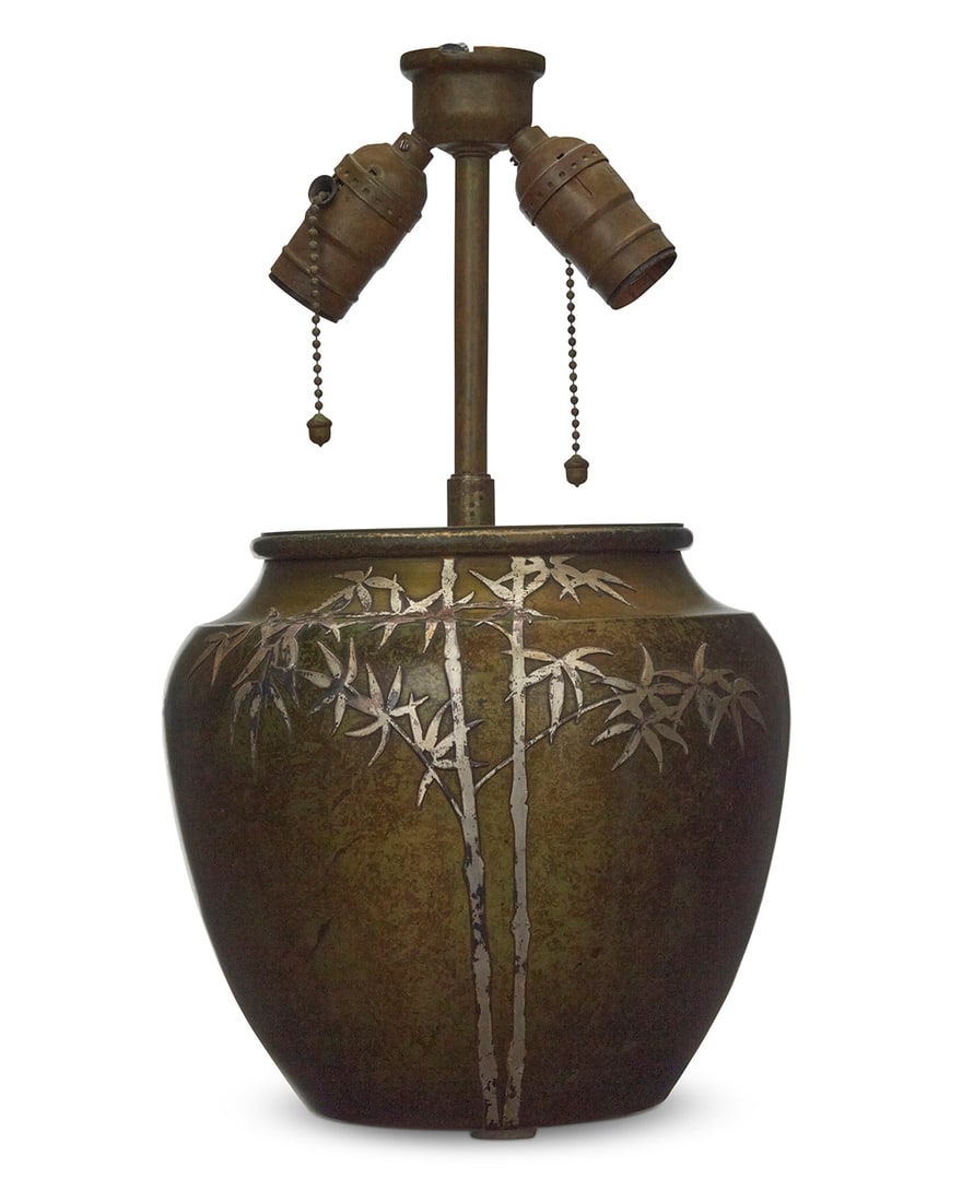 A Heintz Art Metal Shop silver overlay lamp base: A Heintz Art Metal Shop silver overlay lamp baseEarly 20th centuryImpressed factory mark and: STERLING / ON BRONZE / PAT. AUG 27, 12 / 5505 BThe verdigris patinated bronze base with silver overlay bam