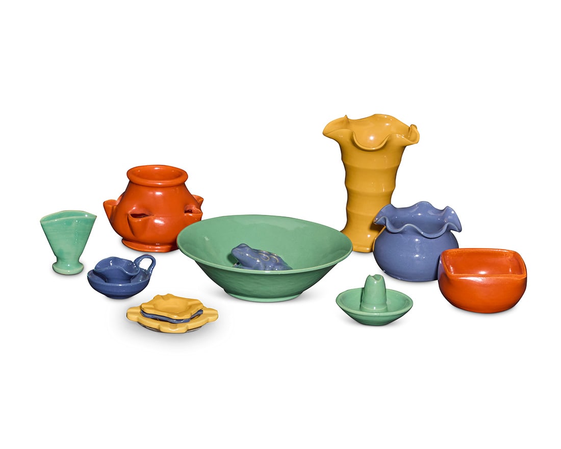 A group of Matt Carlton glazed pottery items for Bauer: A group of Matt Carlton glazed pottery items for Bauer Circa 1930s Five drip trays impressed: BAUER / LOS ANGELES; and variously numbered 8 or 10 Comprising: 3 strawberry pots 3 fan vases 3 ribbon