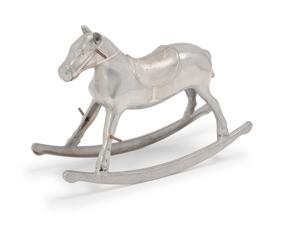 A Pony Boy aluminum rocking horse: A Pony Boy aluminum rocking horse Circa late 1940s Marked in the casting: PONY BOY MFG CO KALAMAZOO MIC 23.25" H x 11.75" W x 34" D