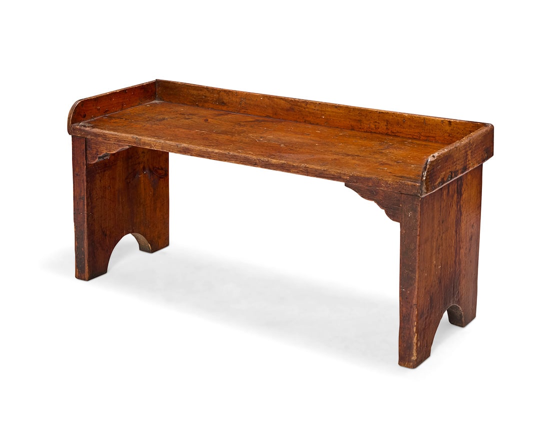 An American pine farmhouse bench: An American pine farmhouse bench19th centuryWith shaped corbels and demilune cutouts to supports18.5" H x 38.25" W x 14.5" D