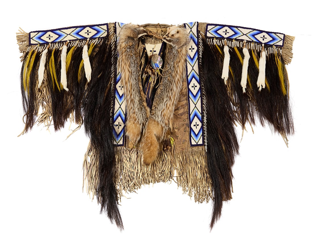 A Cheri Cappello beaded Plains style "Running Buck" 'Crow' shirt': A Cheri Cappello beaded Plains style "Running Buck" 'Crow' shirt' Cheri Cappello (b. 20th century) Late 20th/early 21st century Signed in ink to interior: Cheri Cappello / CCR; with attached label: "