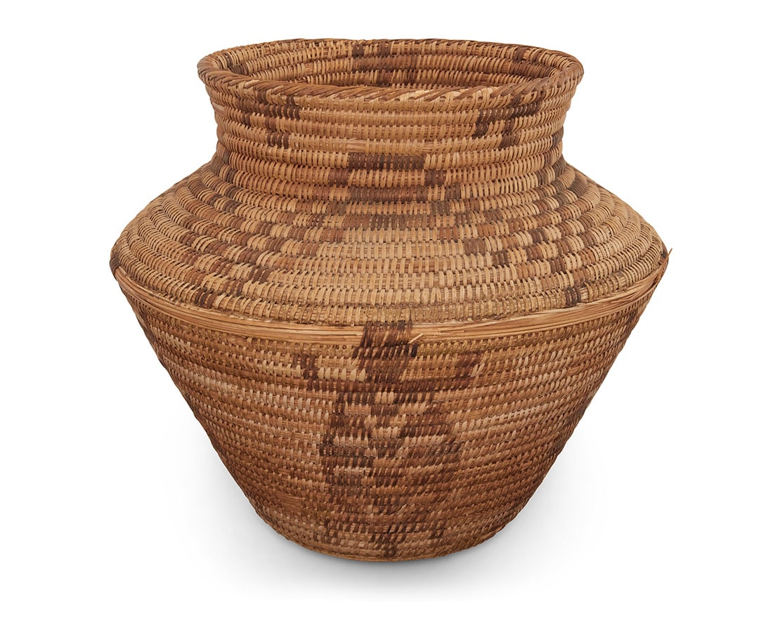 A large Pima pictorial basketry olla: A large Pima pictorial basketry ollaEarly 20th century, Akimel O'odham; Southwest United StatesA large coiled olla with checkered zigzag banding to waist, and five likely chuckwalla lizard motifs belo