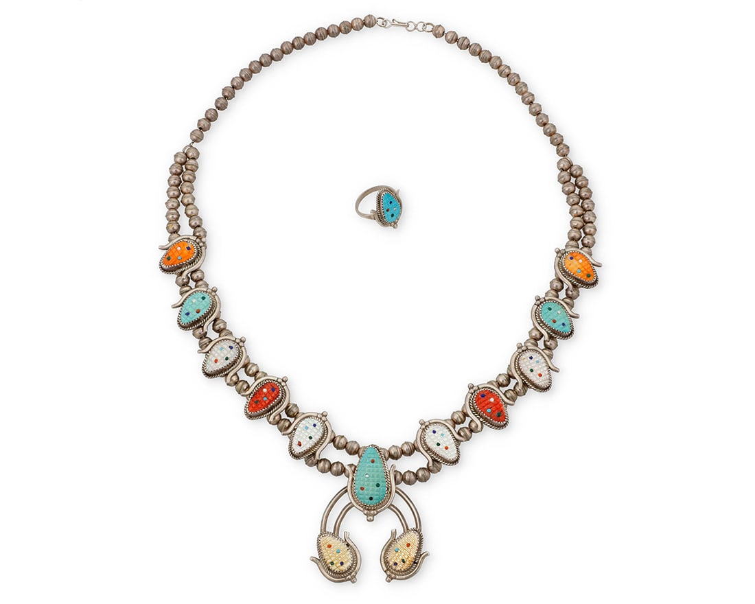 A set of Beverly Etsate Zuni sterling silver and stone set jewelry: A set of Beverly Etsate Zuni sterling silver and stone set jewelry Beverly Etsate (b. 20th century, Zuni) Late 20th/21st century Etched: Bev Etsate / Zuni Comprising a Zuni squash blossom necklace
