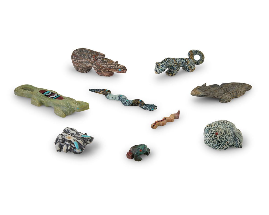 A group of Zuni carved stone fetish reptiles and amphibians: A group of Zuni carved stone fetish reptiles and amphibiansMid/late 20th century, mostly Zuni PuebloMost variously incised with signature, initials, or artist's cipherFrom artists including Garrick Ac