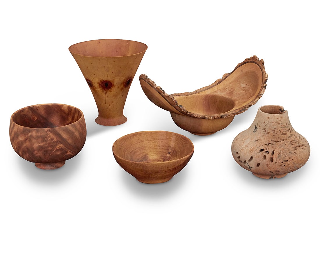 A group of wood turned vessels: A group of wood turned vesselsLate 20th centuryLive edge burn marked: John Berglund / 97; conical incised: T. Van Cleave / Norfolk / Pine; one incised: Howard Lewis / Persimmon / 11/90; larger bowl in
