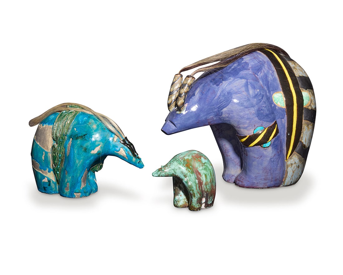 Three glazed pottery fetish bears: Three glazed pottery fetish bearsLate 20th centuryThe smallest with incised initial and date: SMB / 5/96Two depicted with medicine/offering wrap and mounted with horse hair3 piecesLargest: 12.25" H x