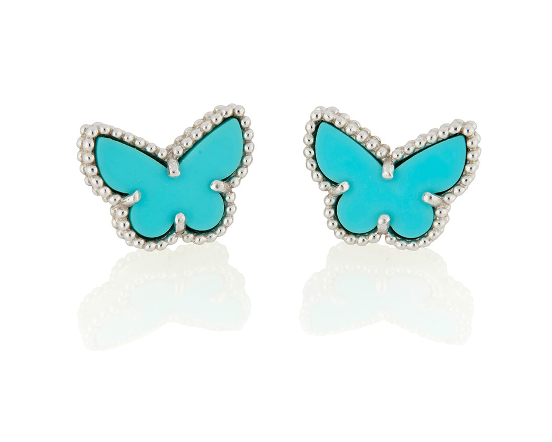 Van Cleef & Arpels: A Pair of 18K White Gold and Turquoise 'Sweet Alhambra Butterfly' Earrings: Van Cleef & Arpels: A Pair of 18K White Gold and Turquoise 'Sweet Alhambra Butterfly' Earrings Of a butterfly design featuring carved turquoise, signed VCA JE066688 2 pieces Measures: 1/2 x 1/4 in.