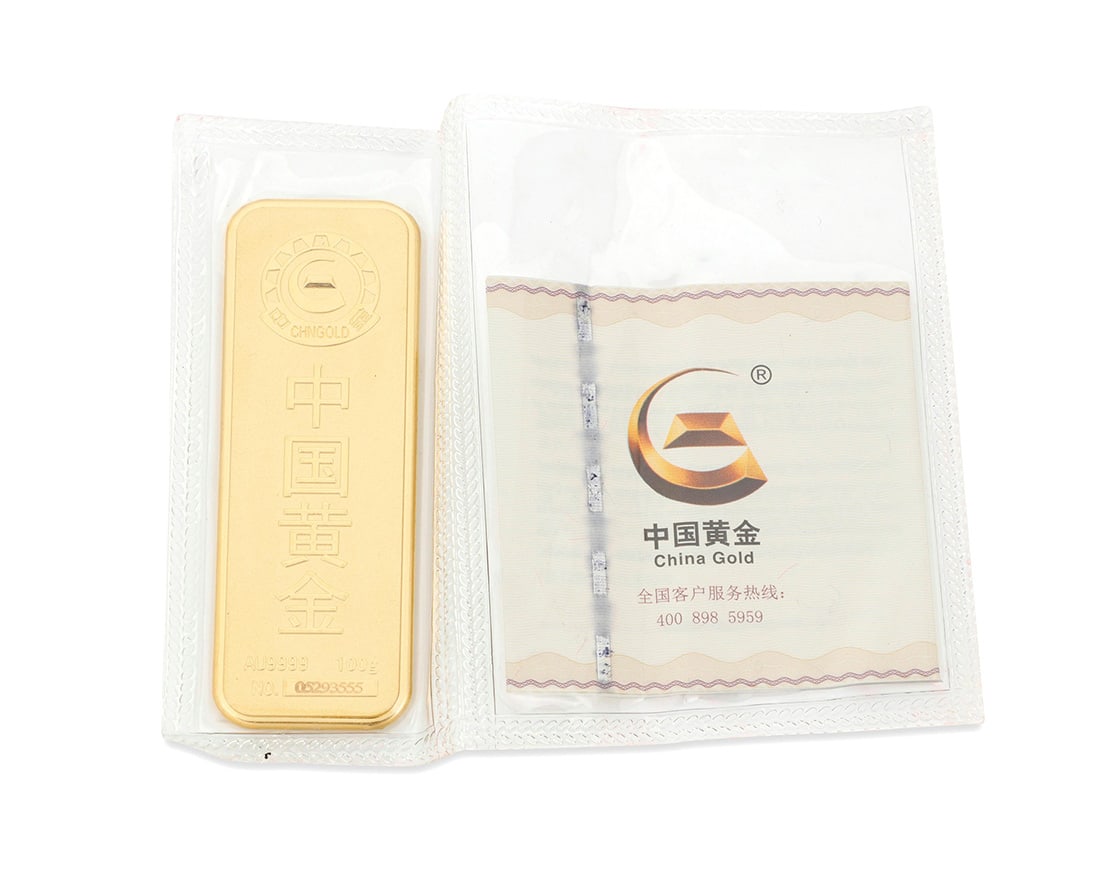 A 24K Chinese Gold Bar: A 24K Chinese Gold Bar Signed CHNGOLD, no.05293555 Measures: 3 1/4 x 1 in. 100.0 grams gross