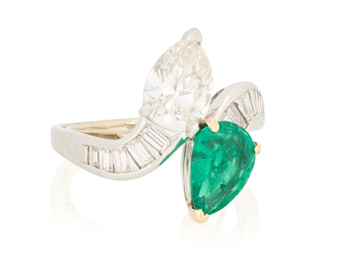 A Platinum, Diamond and Emerald Toi et Moi Ring (1 of 5)