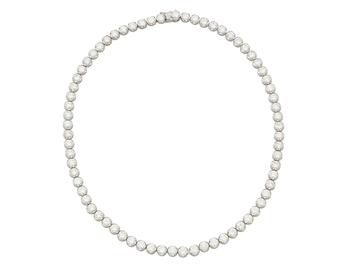 A 14K White Gold and Diamond Necklace: A 14K White Gold and Diamond Necklace Featuring seventy round diamonds weighing approximately 24.72 carats Length: 17 in. 31.7 grams gross