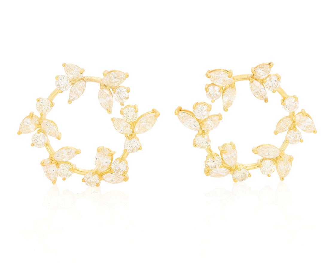 A Pair of 14K Gold and Diamond Earrings: A Pair of 14K Gold and Diamond Earrings Of a wreath design featuring floral motifs set with round and marquise-shaped diamonds weighing approximately 9.54 carats 2 pieces Measures: 1 3/8 x 1 3/8 in.
