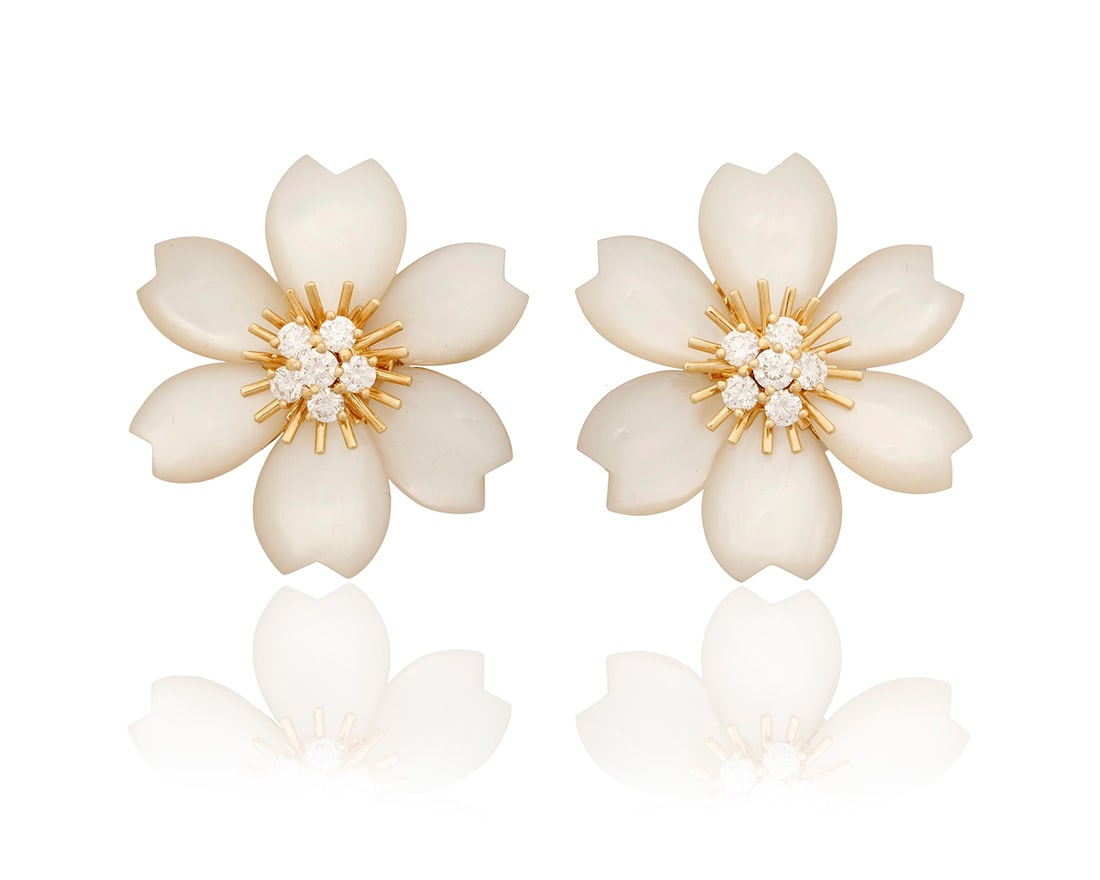 Van Cleef & Arpels: A Pair of 18K Gold, Mother-of Pearl and Diamond 'Rose de Noel' Earrings: Van Cleef & Arpels: A Pair of 18K Gold, Mother-of Pearl and Diamond 'Rose de Noel' Earrings Of a floral design featuring carved mother-of pearl petals centering round diamonds weighing approximately
