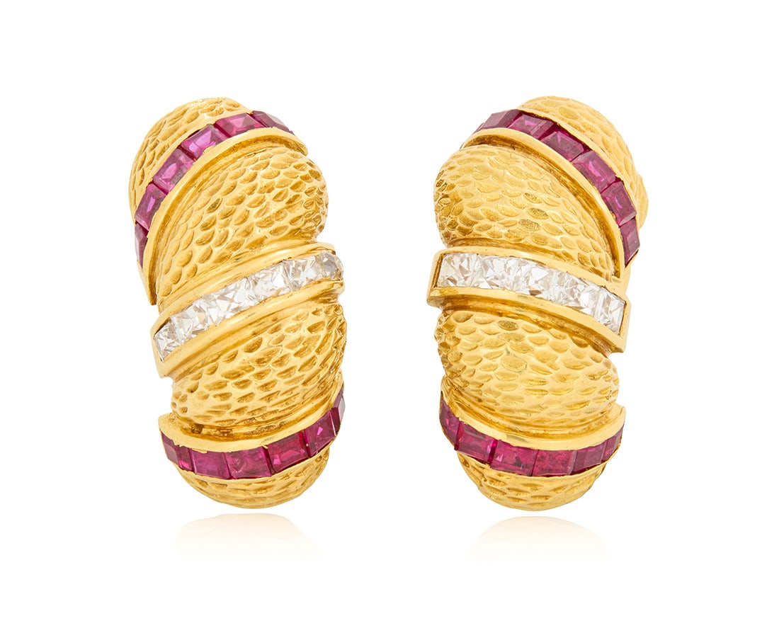 A Pair of 18K Gold, Ruby, and Diamond Earrings: A Pair of 18K Gold, Ruby, and Diamond Earrings Of a textured gold design featuring bands of square-cut red rubies weighing approximately 3.00 carats, and French-cut diamonds weighing approximately