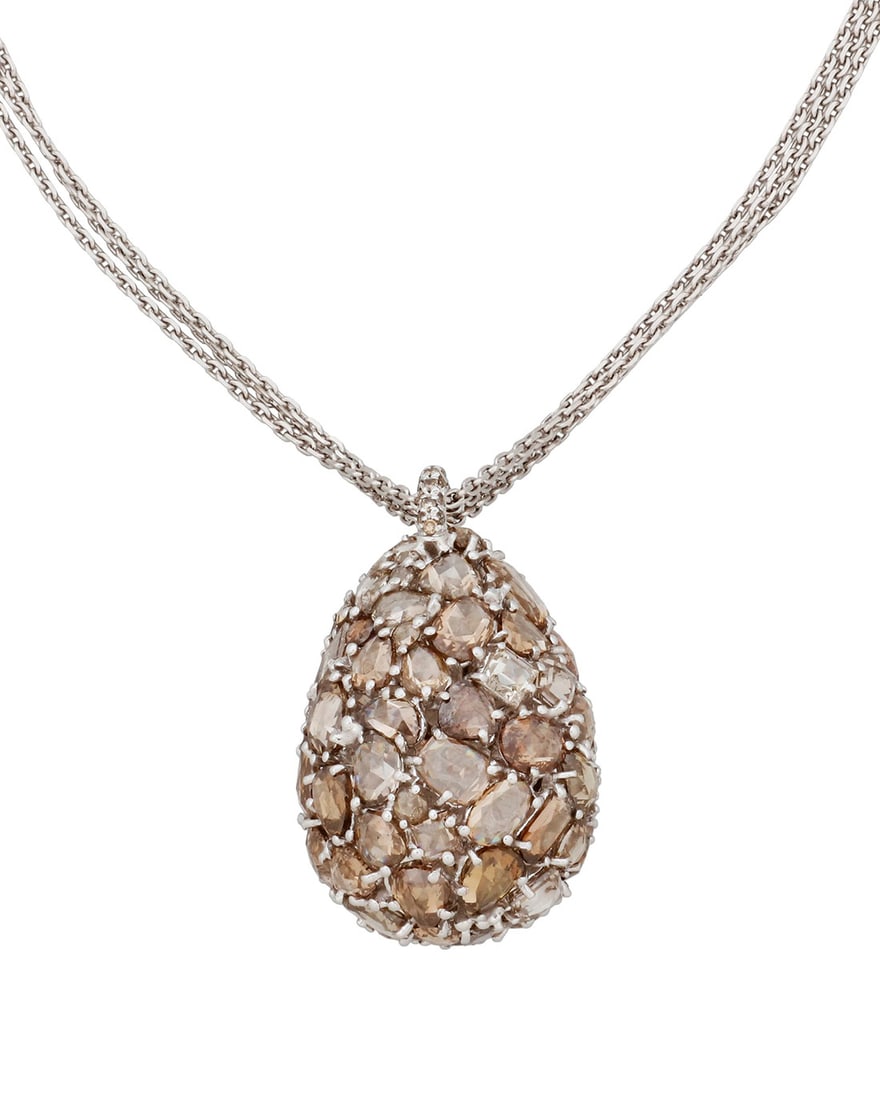 Chopard: An 18K White Gold and Colored Diamond Necklace: Chopard: An 18K White Gold and Colored Diamond Necklace Featuring a triple-strand chain suspending a drop pendant set with variously shaped rose-cut colored diamonds weighing approximately 18.00