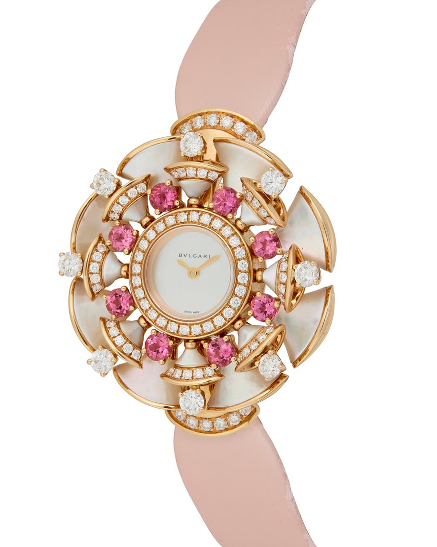 Bulgari: An 18K Rose Gold, Mother-of Pearl and Diamond 'Diva's Dream' Watch: Bulgari: An 18K Rose Gold, Mother-of Pearl and Diamond 'Diva's Dream' WatchDial: 13.00 mm, round mother-of-pearl dial, accented by mother-of- pearl elements, round diamonds and round pink tourmalinesC